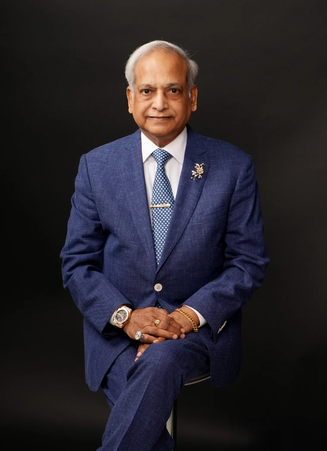 A formal portrait connected to the family's heritage in the gemstone trade