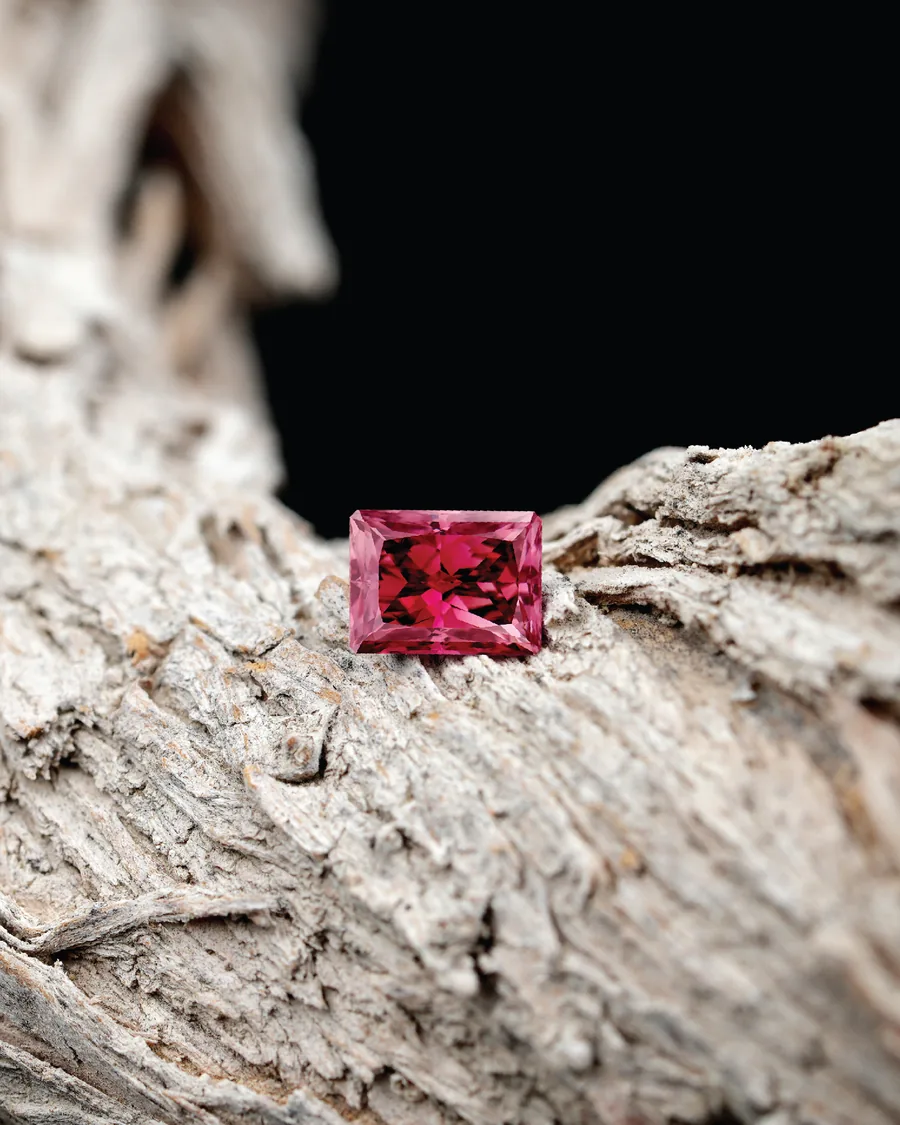 Pink gemstone and diamond ring